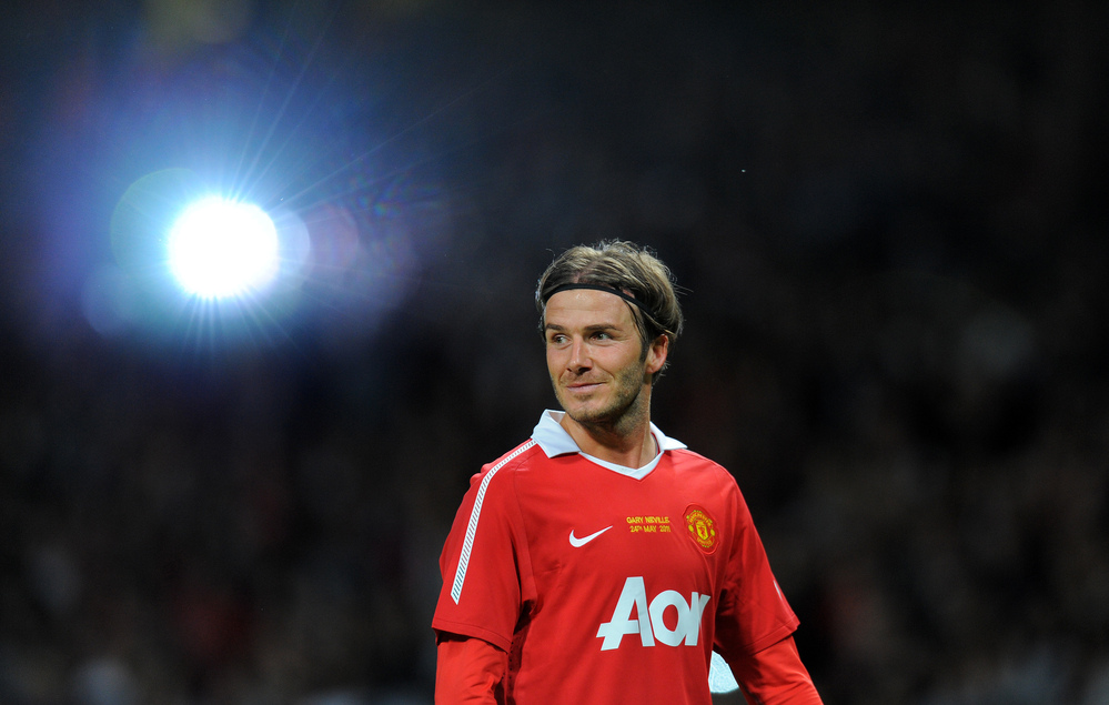 This file photo taken in 2011 shows former Manchester United player David Beckham after a testimonial football match between Manchester United and Juventus for Manchester United's Gary Neville.