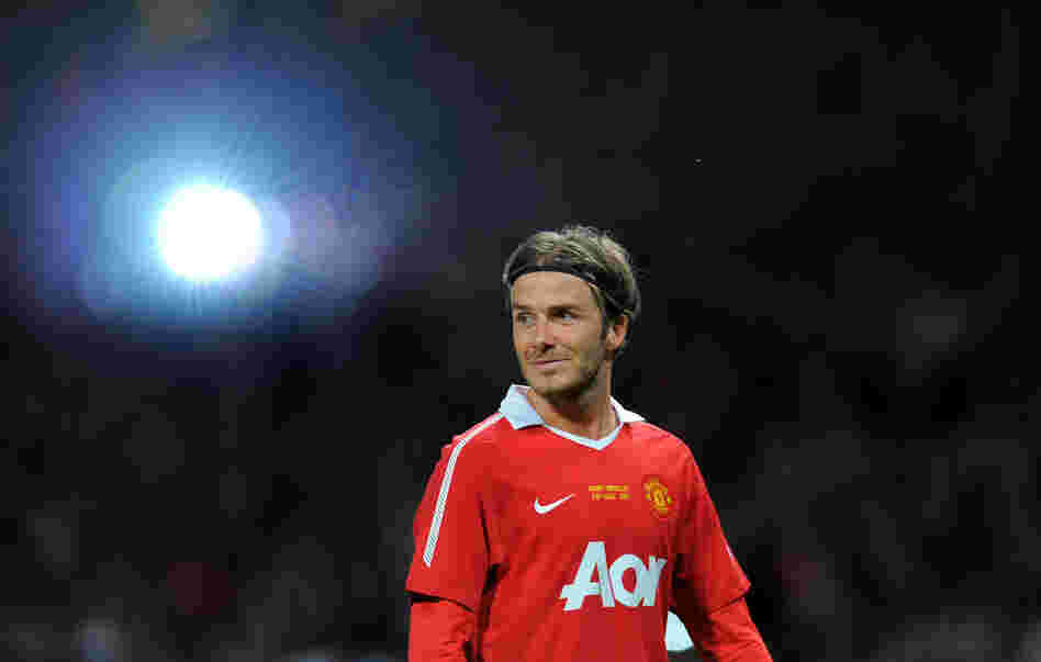 This file photo taken in 2011 shows former Manchester United player David Beckham after a testimonial football match between Manchester United and Juventus for Manchester United's Gary Neville.
