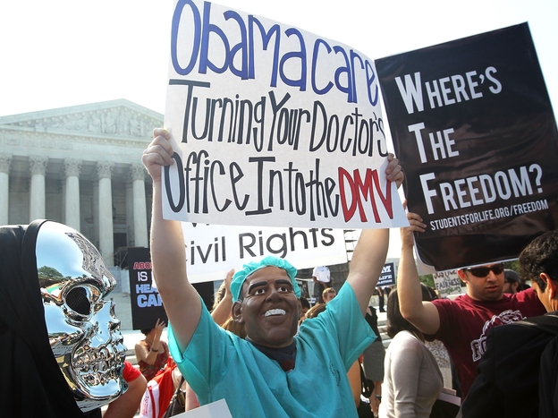 Anti-Obamacare protesters wear masks of President Barack Obama and Grim Reaper as they demonstrate in front of the Supreme Court June 28 in Washington, D.C. The Supreme Court upheld the Affordable Care Act, Obama's landmark health care reforem, this morning.