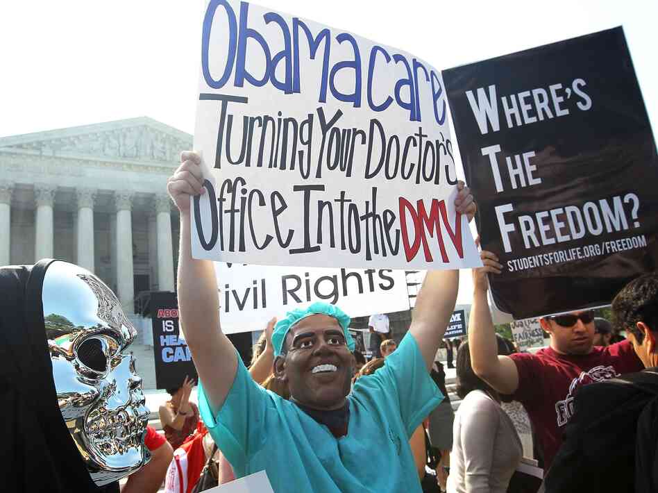 Anti-Obamacare protesters wear masks of President Barack Obama and Grim Reaper as they demonstrate in front of the Supreme Court June 28 in Washington, D.C. The Supreme Court upheld the Affordable Care Act, Obama's landmark health care reforem, this morning.