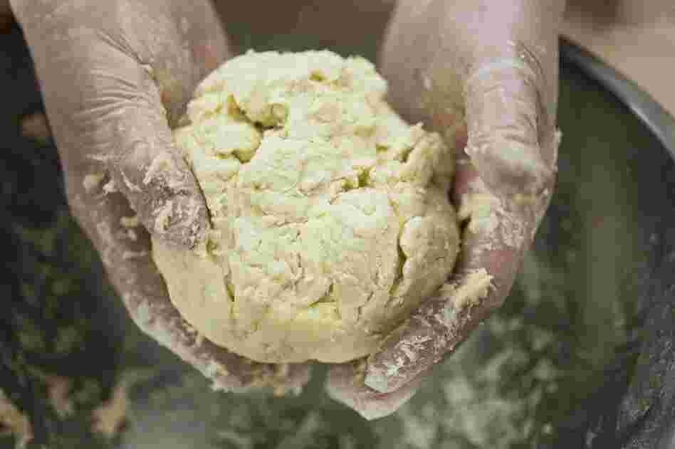"Do not overwork the dough," says Chef Higgins. You want a loose, jaggedy ball.