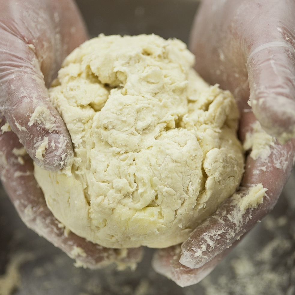 "Do not overwork the dough," says Chef Higgins. You want a loose, jaggedy ball.