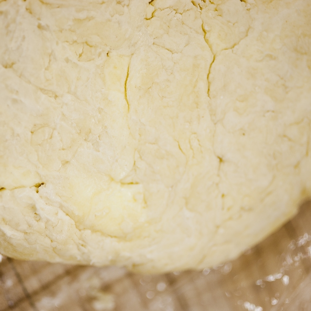 Press ball gently into a disk, refrigerate in plastic for an hour or so before rolling.