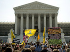 Protesters and supporters of President Obama's health care law await the Supreme Court's ruling Thursday. The court ruled to uphold the law. The focus now shifts to the states, which are responsible for the lion's share of getting people without insurance covered. Protesters and supporters of President Obama's health care law await the Supreme Court's ruling Thursday. The court ruled to uphold the law. The focus now shifts to the states, which are responsible for the lion's share of getting people without insurance covered.