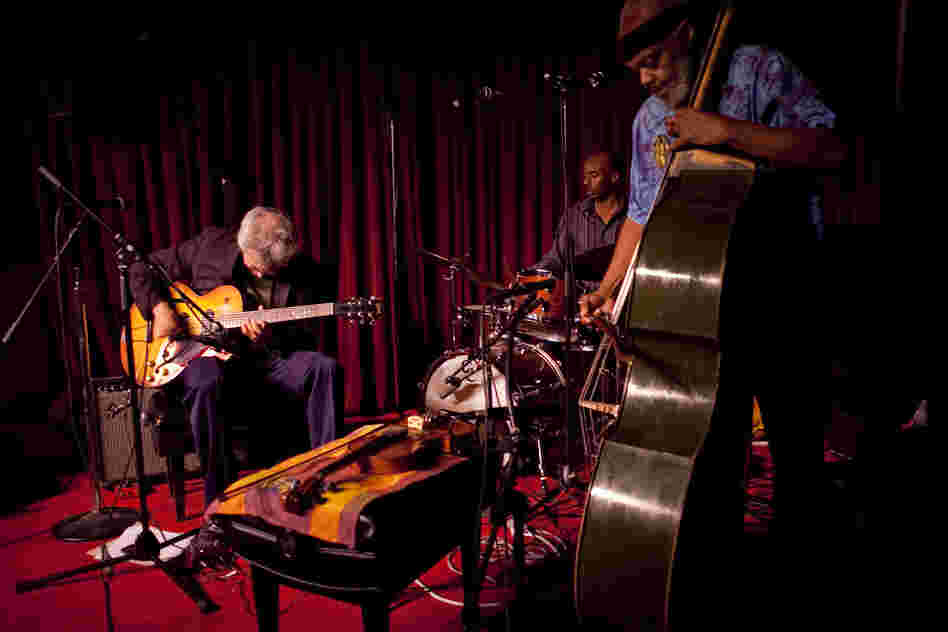 From left, Marc Ribot (guitar), Chad Taylor (drums) and Henry Grimes (bass) performed at the Village Vanguard in New York City on Wednesday, June 27, 2012.