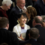 Myanmar opposition leader Aung San Suu Kyi smiles as she leaves Westminster Hall after addressing both Houses of Parliament on June 21 in London.