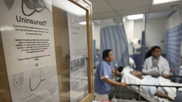 A bulletin board in New York's Jamaica Hospital offers advice for uninsured patients. (AP)