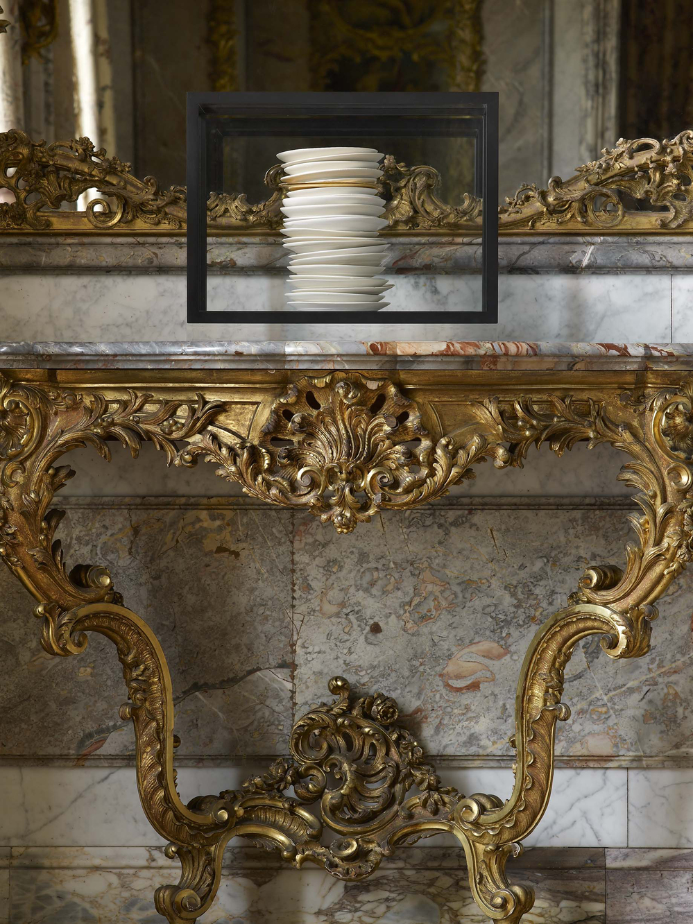 De Waal's 2012 work all and more is on display in the Dining Room. It is made up of 23 porcelain dishes: 22 in white and cream glazes and one gilded dish, contained in a clear glass vitrine.