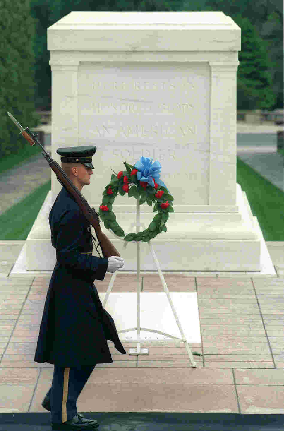A sentinel walks post at the Tomb of the Unknowns at Arlington National Cemetery, another of the monumental backdrops in Lawson's crime novels.