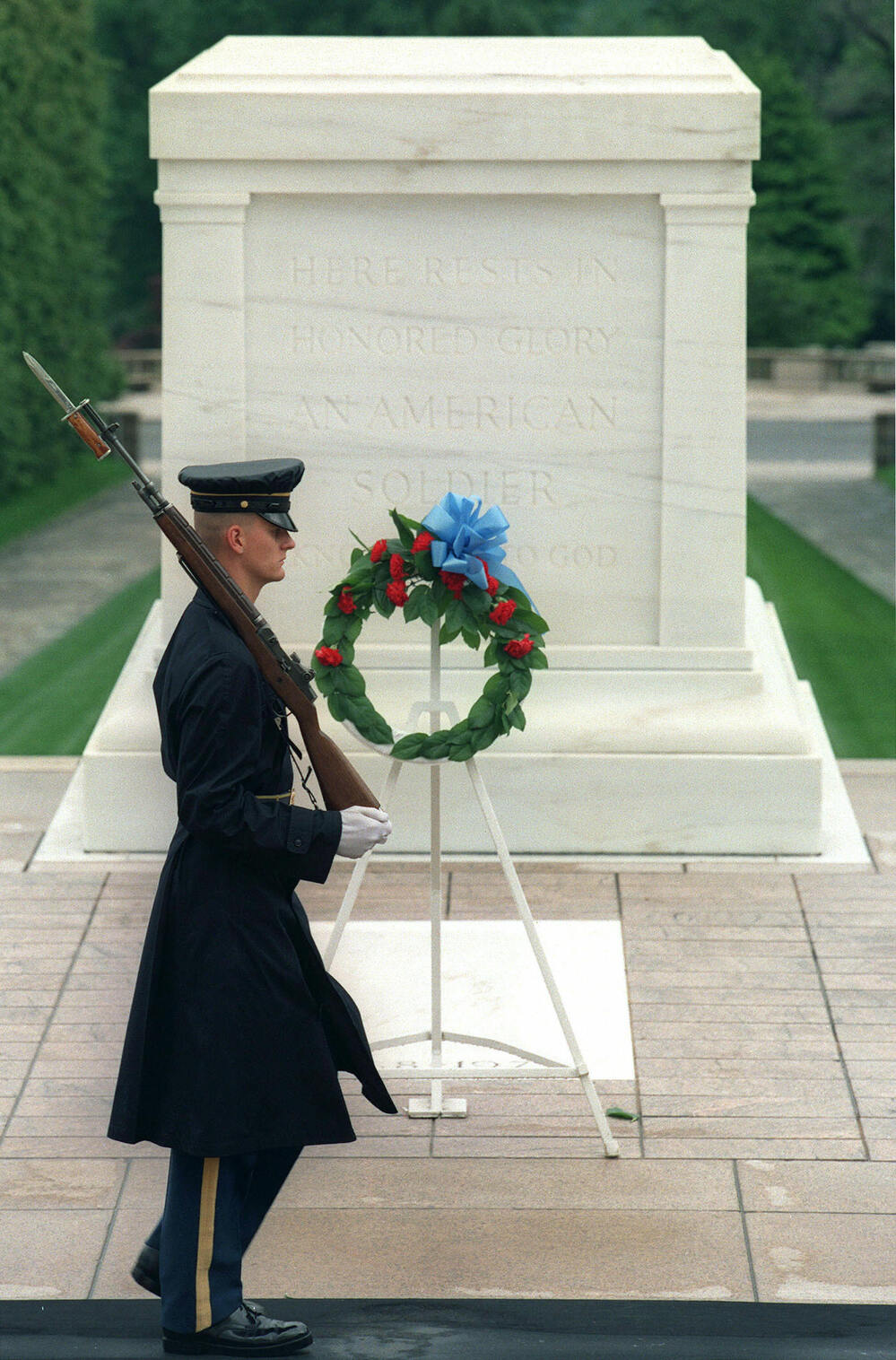 A sentinel walks post at the Tomb of the Unknowns at Arlington National Cemetery, another of the monumental backdrops in Lawson's crime novels.