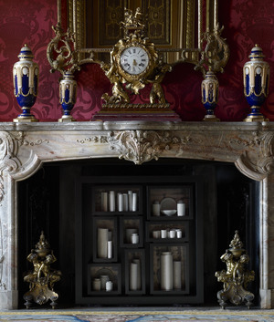 In the Red Drawing Room, de Waal has placed 48 thrown porcelain vessels, jars and dishes in the hearth for his work the properties of fire.