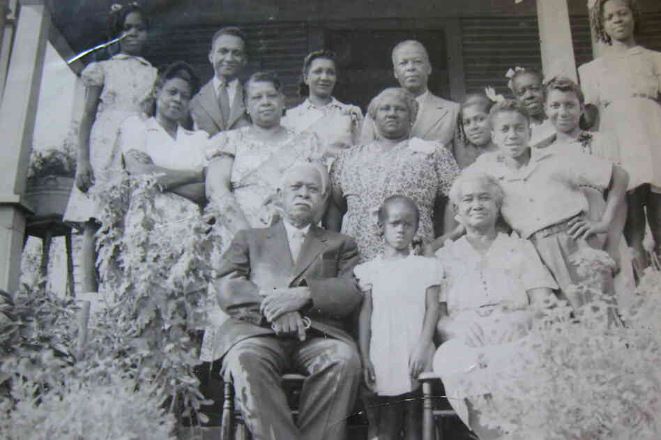 The first lady's maternal great-great-grandfather Dolphus Shields (seated) was born to Melvinia Shields. After emancipation, he settled his family in Birmingham, Ala., where he stayed until his death in 1950.