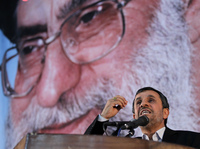 Iranian President Mahmoud Ahmadinejad, shown speaking June 2 under a portrait of Iran's supreme leader, Ayatollah Ali Khamenei, has said Iran will not bow to sanctions.