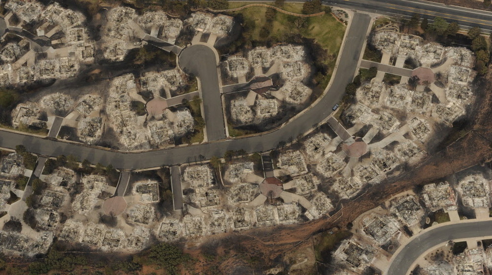 This aerial photo taken Thursday shows the destructive path of the Waldo Canyon fire in the Mountain Shadows subdivision area of Colorado Springs, Colo.