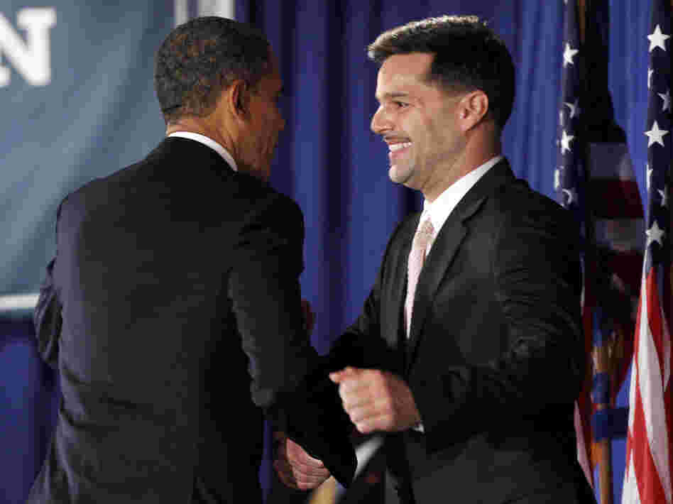 President Obama is introduced by singer Ricky Martin at a fundraiser hosted by Martin and the LGBT Leadership Council at the Rubin Museum of Art on May 14 in New York.