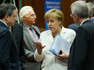 German Chancellor Angela Merkel talks with European Central Bank President Mario Draghi (left) and Italian Prime Minister Mario Monti (right) during the summit of European leaders in Brussels. German Chancellor Angela Merkel talks with European Central Bank President Mario Draghi (left) and Italian Prime Minister Mario Monti (right) during the summit of European leaders in Brussels.
