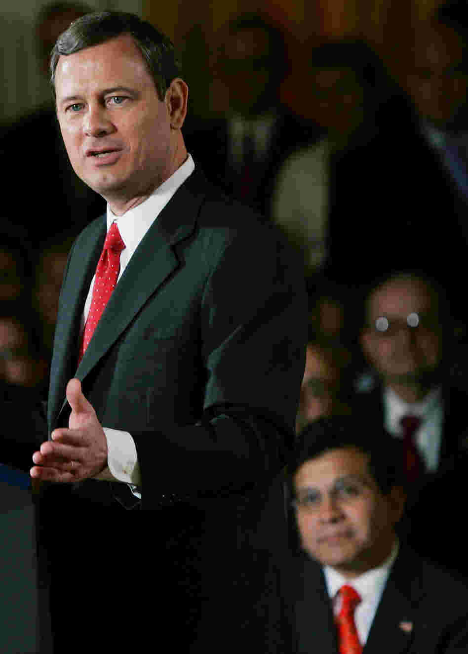 Sept. 29, 2005: Then-Attorney General Alberto Gonzales, at lower right, watches as Supreme Court Chief Justice John Roberts speaks after being sworn in. Sept. 29, 2005: Then-Attorney General Alberto Gonzales, at lower right, watches as Supreme Court Chief Justice John Roberts speaks after being sworn in.