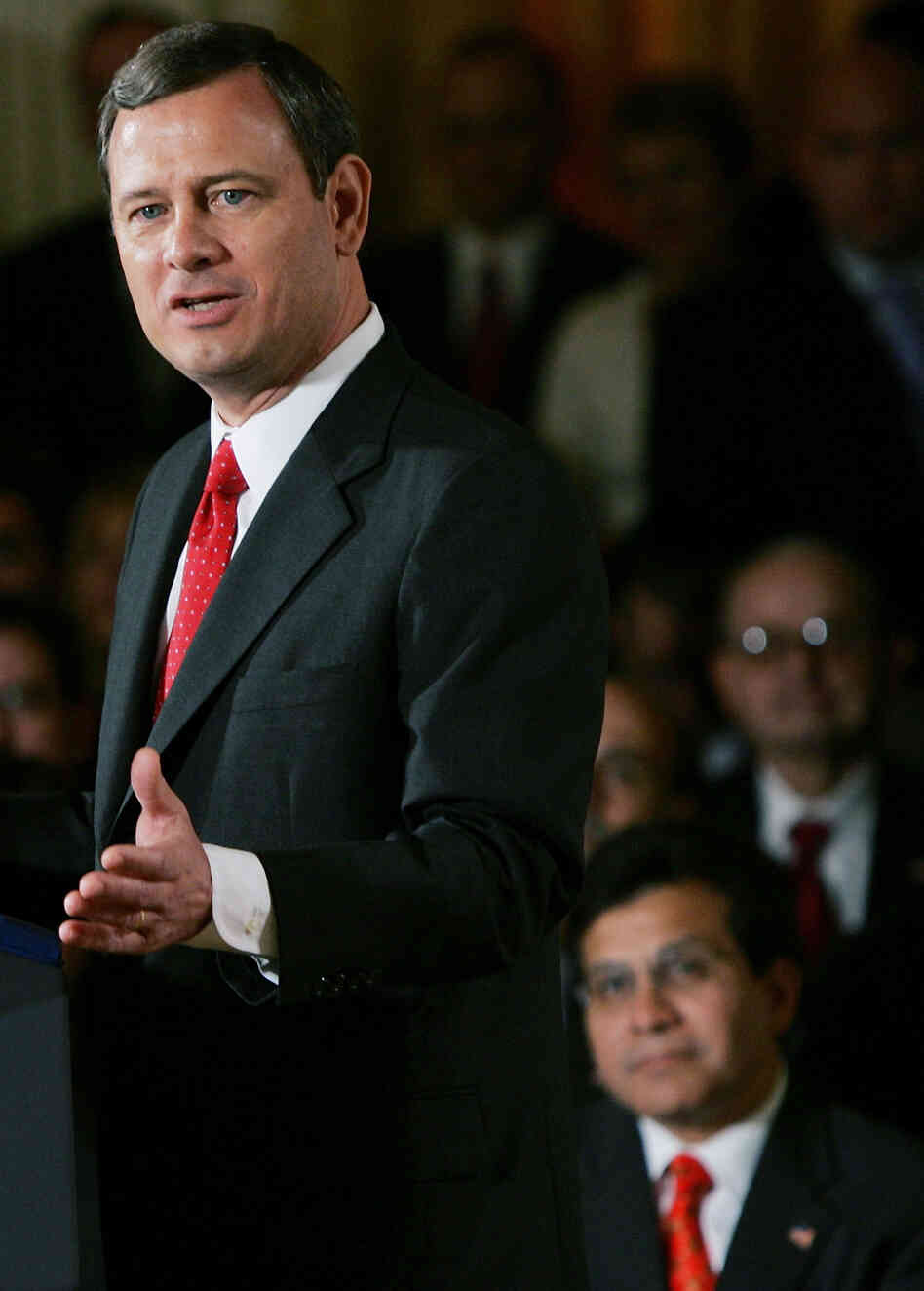 Sept. 29, 2005: Then-Attorney General Alberto Gonzales, at lower right, watches as Supreme Court Chief Justice John Roberts speaks after being sworn in. Sept. 29, 2005: Then-Attorney General Alberto Gonzales, at lower right, watches as Supreme Court Chief Justice John Roberts speaks after being sworn in.