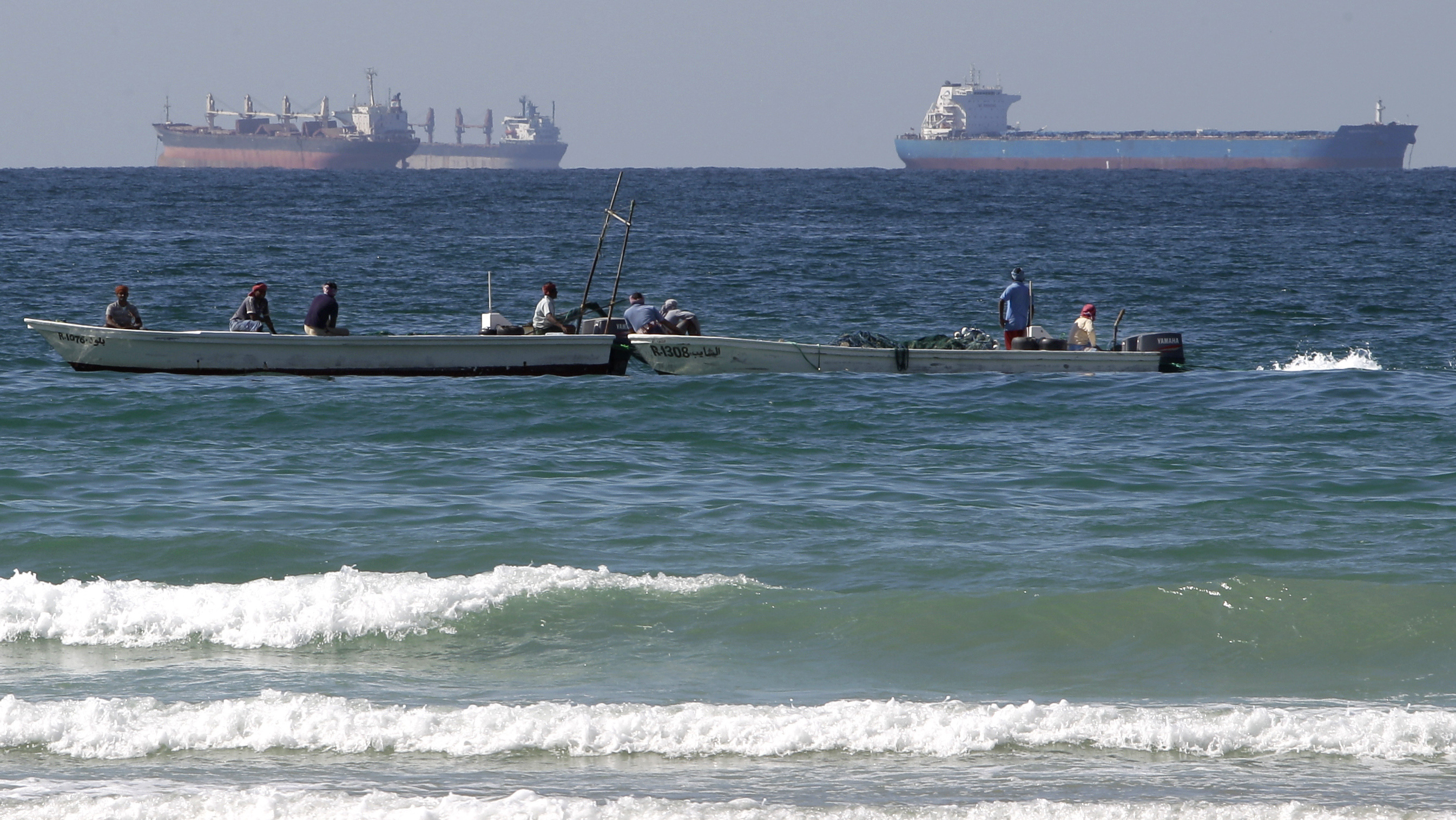 European countries have agreed to stop importing Iranian oil as of Sunday. This could make it harder for Iran to find markets for its crude. Iran has been filling up tankers off its coast, but analysts say it could run out of storage capacity. This photo shows oil tankers off Iran's coast in January.