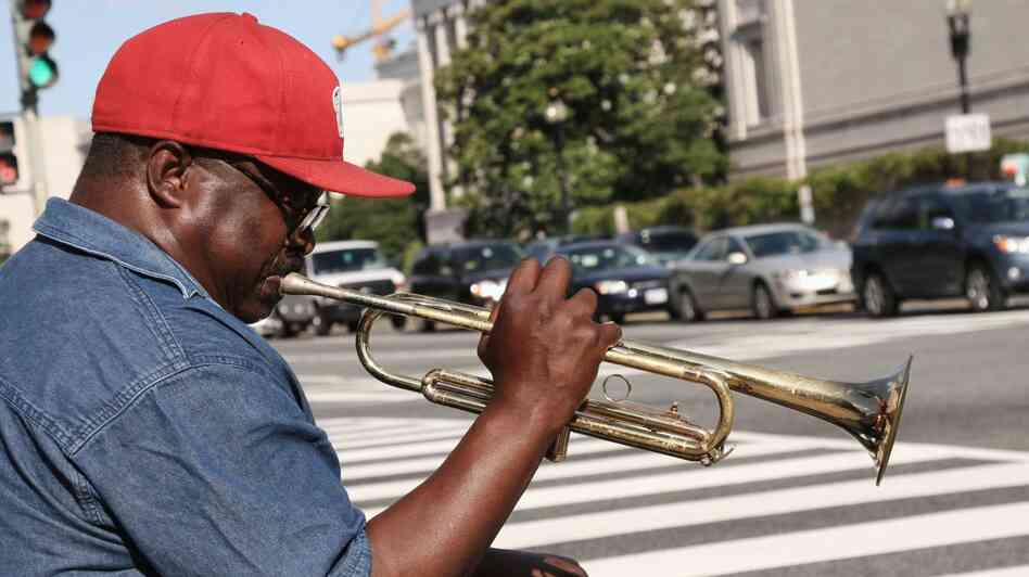Trumpeter John Thornton plays at the corner of 7th Street and Constitution Avenue in Washington, D.C., just a few blocks from NPR's headquarters. Trumpeter John Thornton plays at the corner of 7th Street and Constitution Avenue in Washington, D.C., just a few blocks from NPR's headquarters.