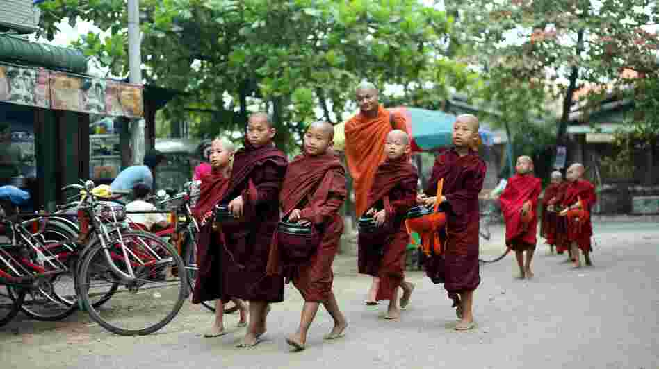 Buddhists donate food and other necessities to monks as a way of earning merit for future lives. Monks have refused donations of alms from the military as a political protest in 1990 and 2007, a boycott that some monks insist is still in effect. Buddhists donate food and other necessities to monks as a way of earning merit for future lives. Monks have refused donations of alms from the military as a political protest in 1990 and 2007, a boycott that some monks insist is still in effect.