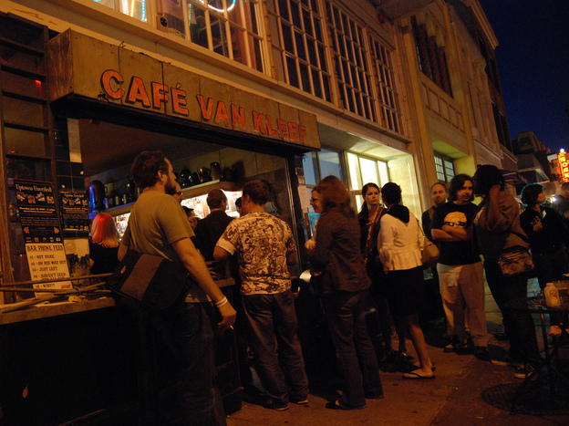 People line up outside Cafe Van Kleef in Oakland.