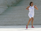 A reporter sprints out of the U.S. Supreme Court building with the health care decision in hand. A reporter sprints out of the U.S. Supreme Court building with the health care decision in hand.