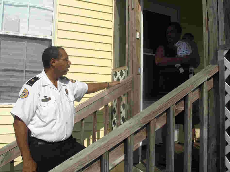 Third District Commander John Thomas urges residents the Gentilly neighborhood to help fight crime and drug violence.