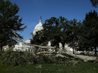 Branches and power lines littered the nation's capital after bruising storms swept through the Mid-Atlantic region on Friday night. Branches and power lines littered the nation's capital after bruising storms swept through the Mid-Atlantic region on Friday night.