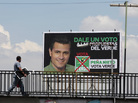 A man walks past a campaign sign for Enrique Pena Nieto, of the opposition Institutional Revolutionary Party. Mexicans vote for their next president on Sunday. A man walks past a campaign sign for Enrique Pena Nieto, of the opposition Institutional Revolutionary Party. Mexicans vote for their next president on Sunday.