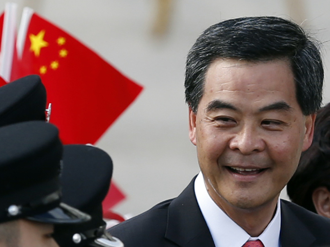 Hong Kong's new Chief Executive Leung Chun-ying attends the flag-raising ceremony to mark the 15th anniversary of the Hong Kong handover to China in Hong Kong Sunday.