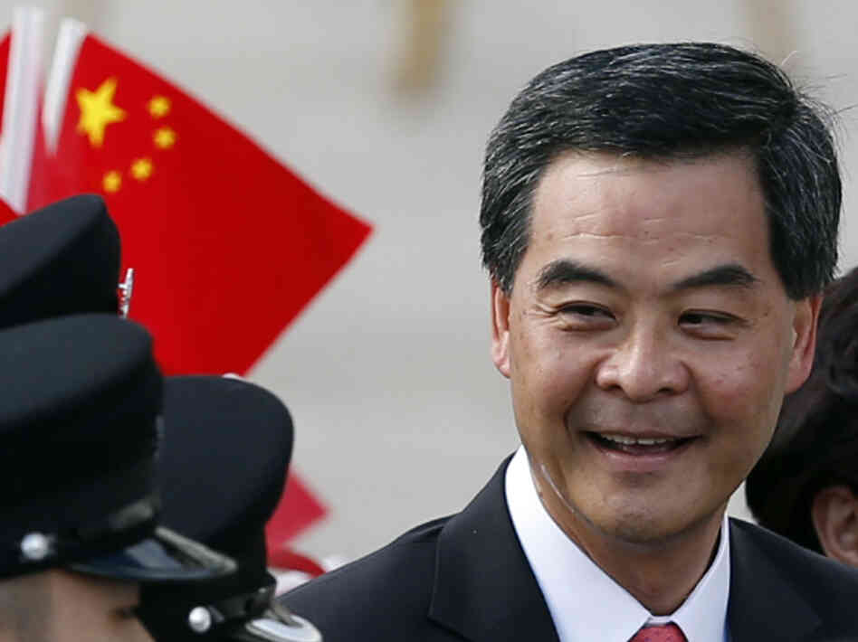 Hong Kong's new Chief Executive Leung Chun-ying attends the flag-raising ceremony to mark the 15th anniversary of the Hong Kong handover to China in Hong Kong Sunday.