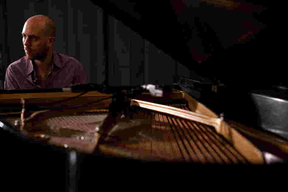 Jason Lindner listens intently as he plays the Steinway.