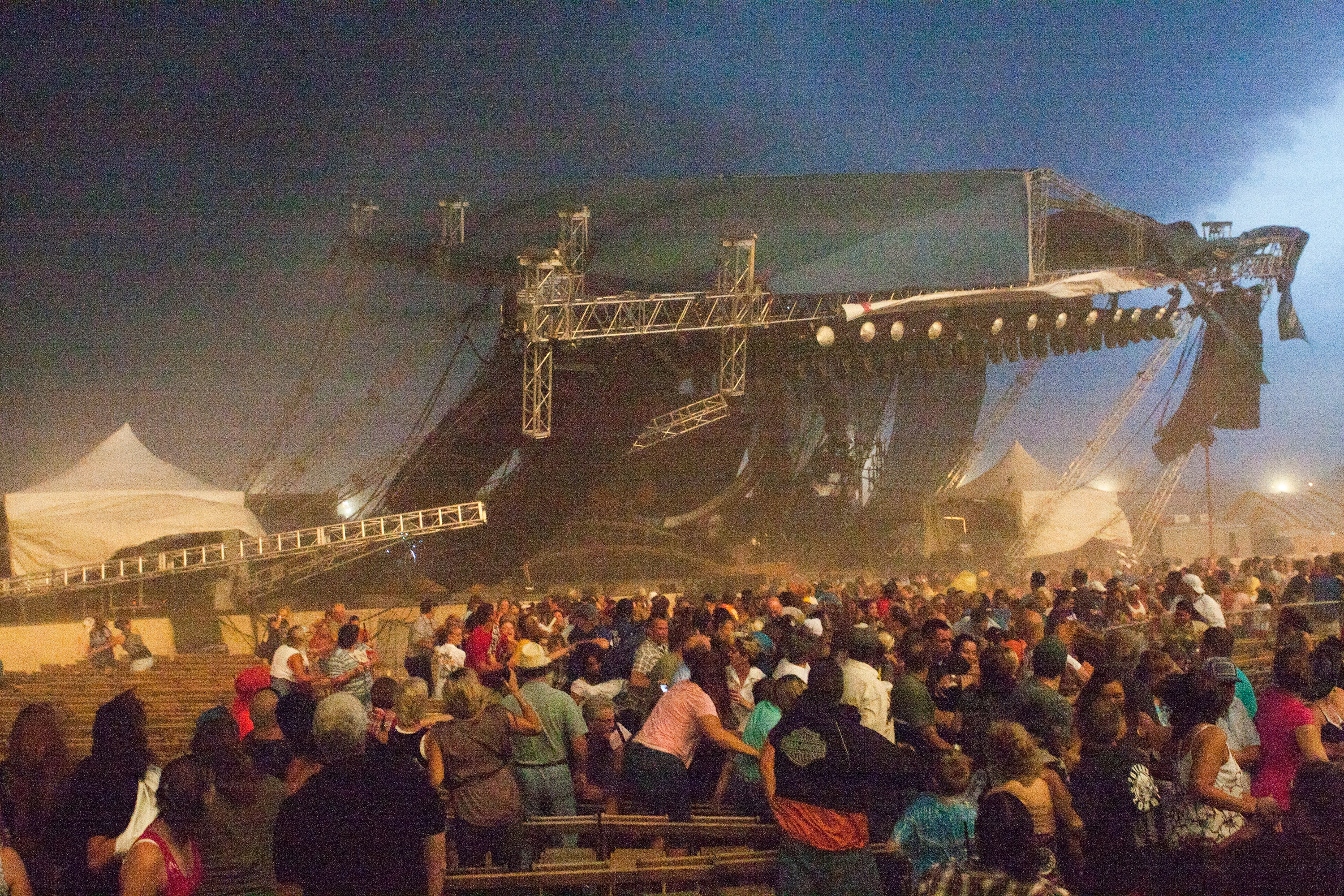 DRY MICROBURST: A stage collapses at the Indiana State Fair on Aug. 13, 2011, in Indianapolis just before the country duo Sugarland was to play. Seven people were killed and 58 injured. (Image credit: Getty Images)