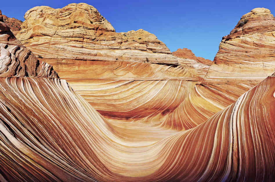 "I was one of the lucky few that have seen this amazing rock formation; only 20 permits are issued a day, and there is an actual lottery to win the permit. This rock formation is Navajo Sandstone which has been created by the natural elements over eons. It is one of the most beautiful things that I have ever seen, and I felt privileged that I had the chance to do so."
