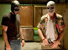 In Savages, two drug dealers — Chon (Taylor Kitsch, left), a former Navy SEAL, and Ben (Aaron Johnson), a pacifist — are forced to take up arms when they anger the head of a Mexican cartel. In Savages, two drug dealers — Chon (Taylor Kitsch, left), a former Navy SEAL, and Ben (Aaron Johnson), a pacifist — are forced to take up arms when they anger the head of a Mexican cartel.