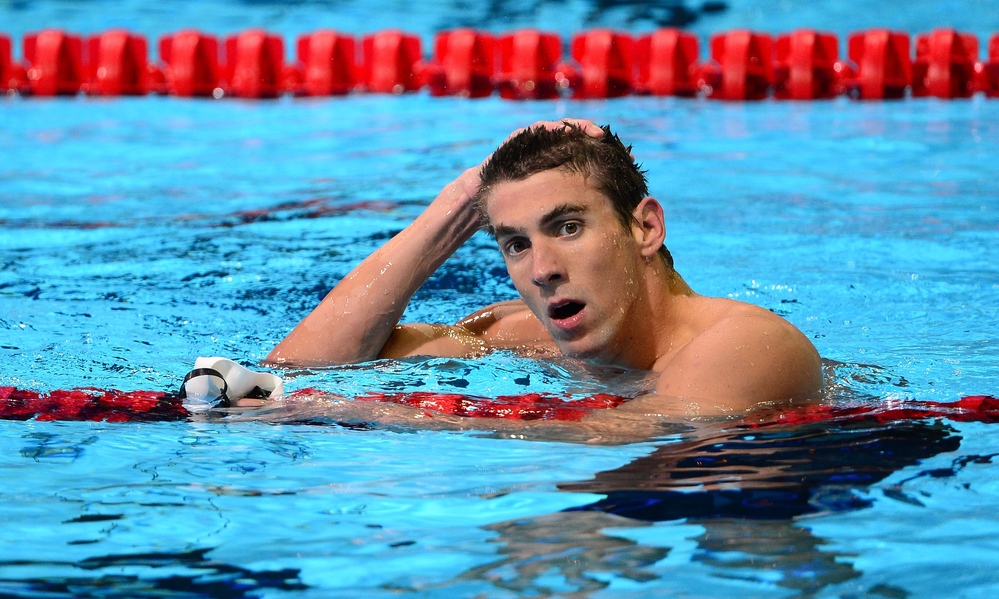 Michael Phelps reacts after winning the men's 200m Butterfly semifinal on day six of the 2012 U.S. Olympic Team Trials on Saturday.
