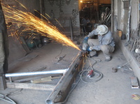 This welding shop in Kabul relies on a generator because the city power supply isn't reliable or powerful enough for the equipment.