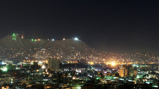 Afghanistan produces about half the power it currently uses and imports the other half from neighboring countries. But that total still doesn't meet the country's demands. This photo shows Kabul at night in January.