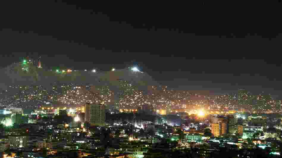 Afghanistan produces about half the power it currently uses and imports the other half from neighboring countries. But that total still doesn't meet the country's demands. This photo shows Kabul at night in January.