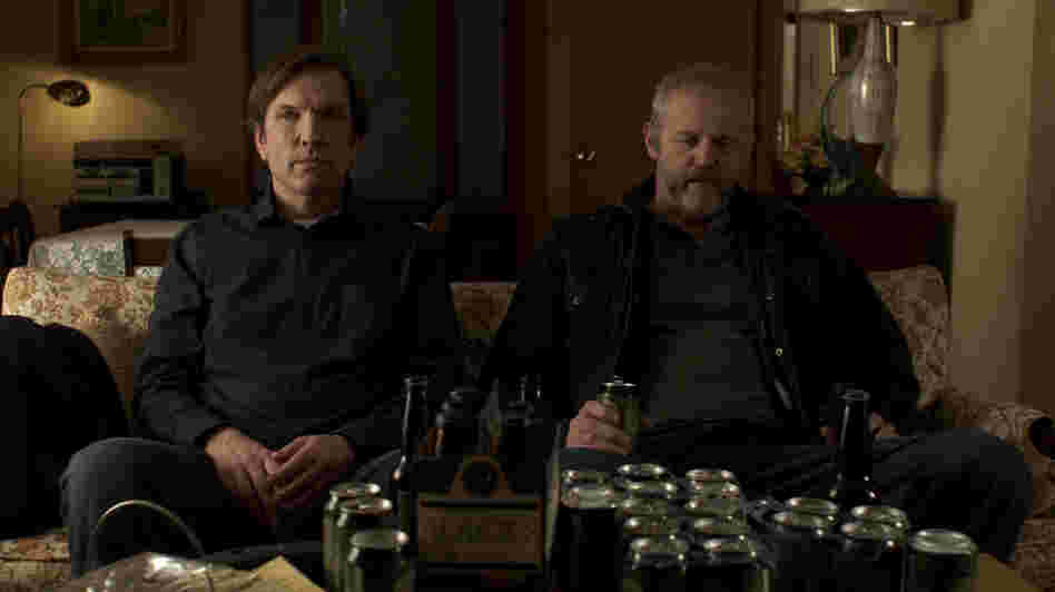 Robert (Martin Donovan, left), a writer in need of inspiration, sits with his uncultured kidnapper, Gus (David Morse), in Collaborator. Donovan also wrote and directed the film. Robert (Martin Donovan, left), a writer in need of inspiration, sits with his uncultured kidnapper, Gus (David Morse), in Collaborator. Donovan also wrote and directed the film.