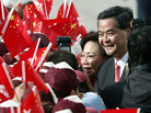 Hong Kong Chief Executive Leung Chun-ying and his wife, Regina, shake hands with supporters Sunday during a flag-raising ceremony to mark the 15th anniversary of Hong Kong's handover to China. Leung was sworn in as Hong Kong's third leader amid growing discontent with China's rule over the Asian financial center. Hong Kong Chief Executive Leung Chun-ying and his wife, Regina, shake hands with supporters Sunday during a flag-raising ceremony to mark the 15th anniversary of Hong Kong's handover to China. Leung was sworn in as Hong Kong's third leader amid growing discontent with China's rule over the Asian financial center.
