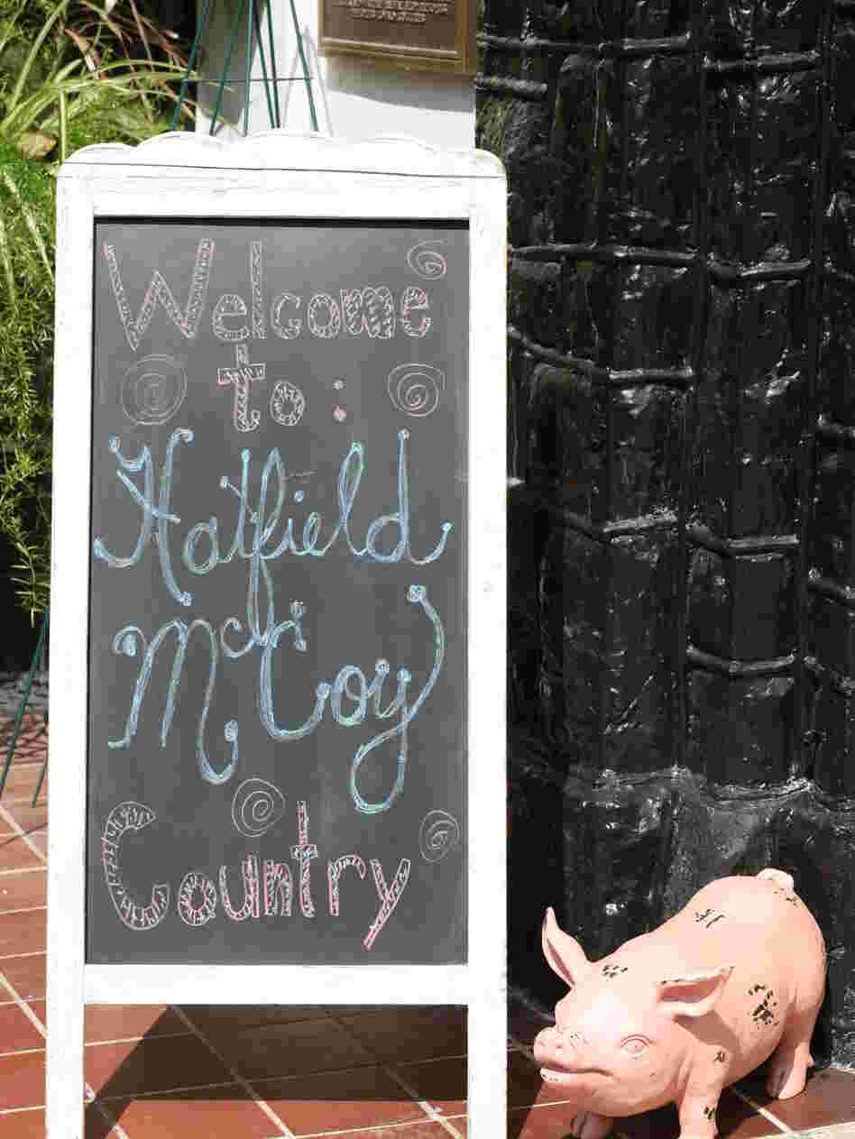 A sign outside the Tug Valley Chamber of Commerce in Williamson, W.Va., welcomes visitors to "Hatfield McCoy Country," referring to a legendary family feud that played out in the Appalachians.