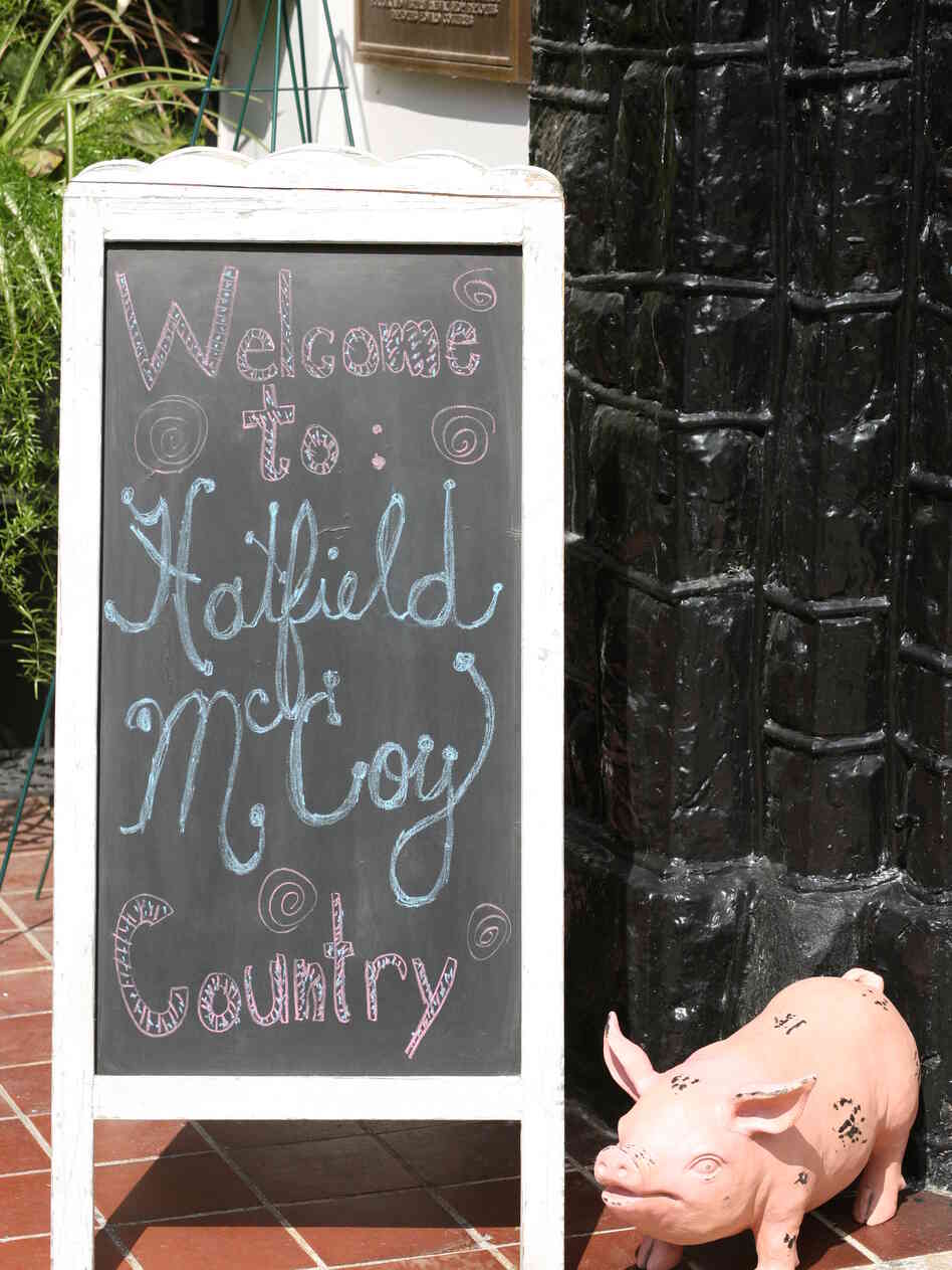 A sign outside the Tug Valley Chamber of Commerce in Williamson, W.Va., welcomes visitors to "Hatfield McCoy Country," referring to a legendary family feud that played out in the Appalachians.