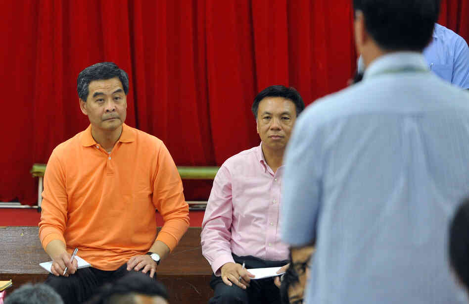 New Hong Kong Chief Executive Leung Chun-ying visits a Welfare Advancement Association on Monday, a day after taking office. Leung vowed he would "humbly" listen to the public, but some critics branded him a lame duck after the restive city's biggest protest in nearly a decade. New Hong Kong Chief Executive Leung Chun-ying visits a Welfare Advancement Association on Monday, a day after taking office. Leung vowed he would "humbly" listen to the public, but some critics branded him a lame duck after the restive city's biggest protest in nearly a decade.