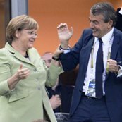 German Chancellor Angela Merkel, German football association president Wolfgang Niersbach and German Interior Minister Hans-Peter Friedrich