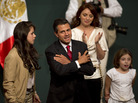Enrique Pena Nieto and his family celebrated Sunday in Mexico City after he claimed victory in the presidential election. Enrique Pena Nieto and his family celebrated Sunday in Mexico City after he claimed victory in the presidential election.