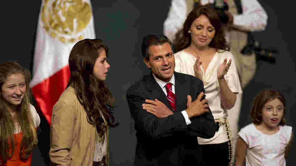 Enrique Pena Nieto and his family celebrated Sunday in Mexico City after he claimed victory in the presidential election.