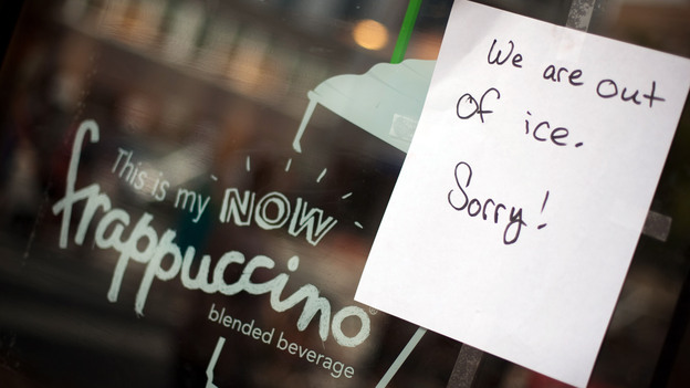 Sign of the times: In Bethesda, Md., a Starbucks breaks some bad news. Ice is in short supply in many places where the power is out.
