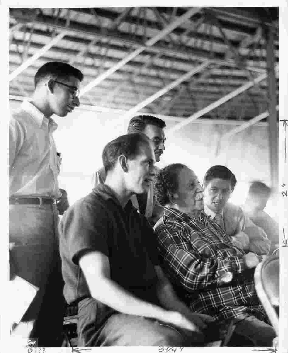 Undated: Conductor Pierre Monteux (in plaid) sits in Tanglewood's famed shed, talking with students.